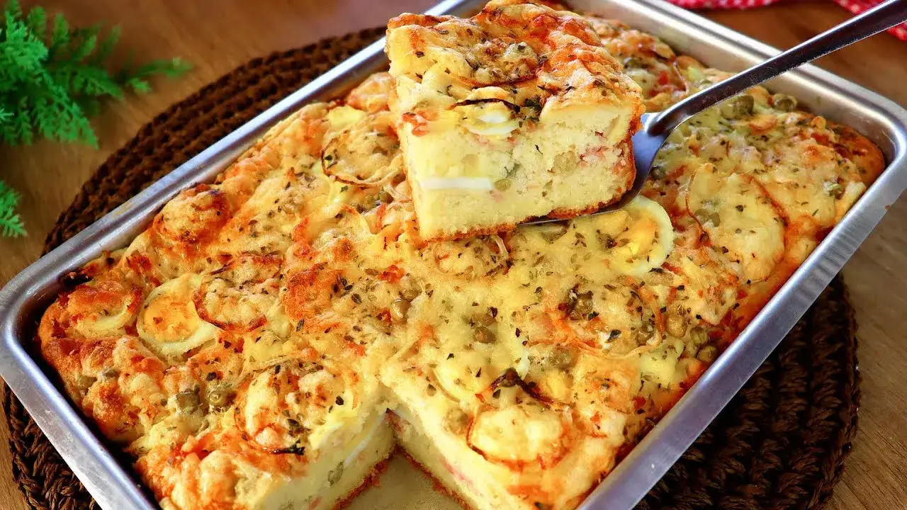 Uma receita prática de torta portuguesa com massa leve feita no liquidificador. Ideal para lanches,...